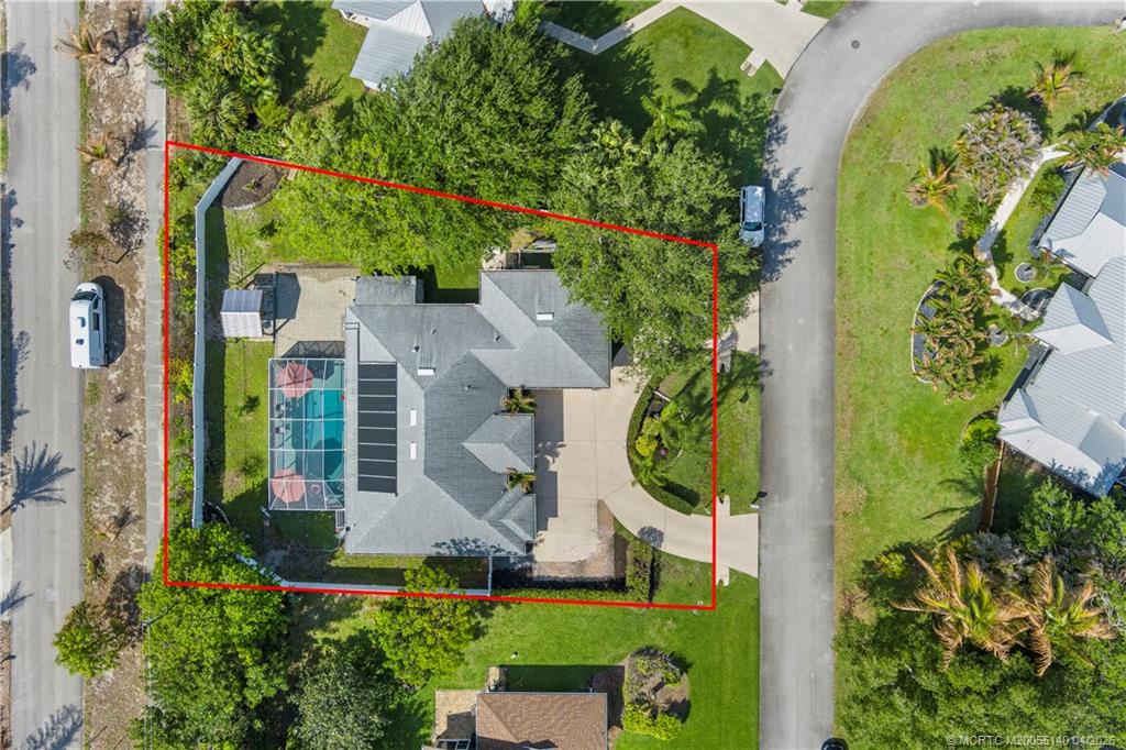 5688 Southeast Pot O Gold Place Stuart, FL 34997 - Photo 37 of 40 an aerial view of a house