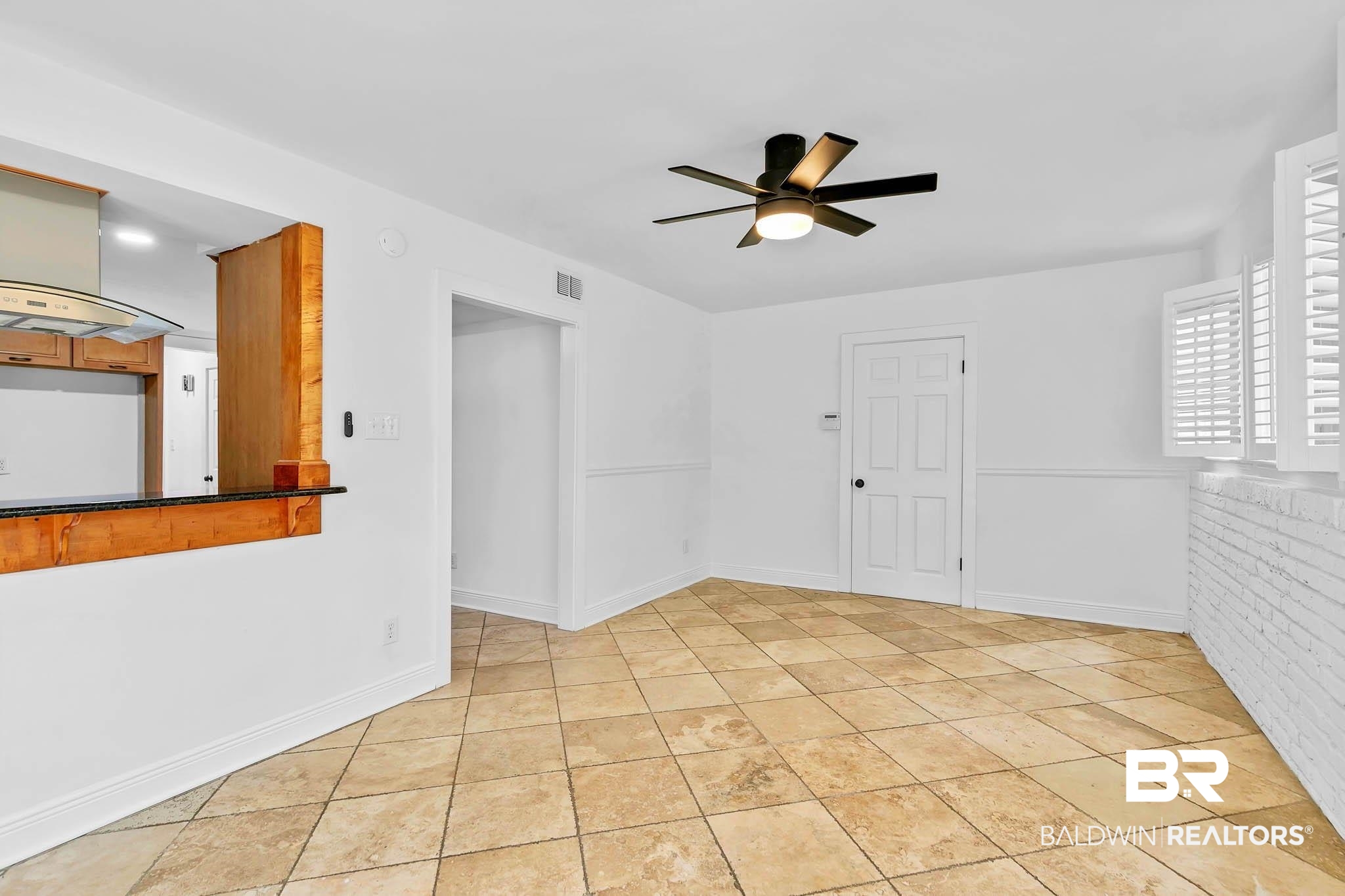 4705 Sherry Court Mobile, AL 36693 - Photo 16 of 100 Spare room with light tile patterned floors and ceiling fan
