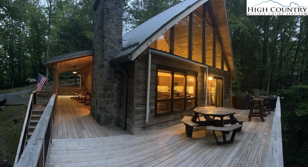 495 Horseshoe Ridge Road East Deep Gap, NC 28618 - Photo 1 of 33 a view of outdoor space yard deck patio and outdoor seating