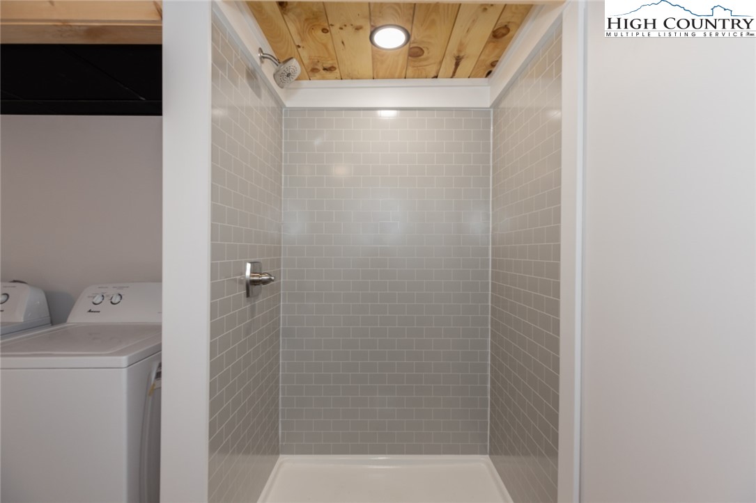 495 Horseshoe Ridge Road East Deep Gap, NC 28618 - Photo 29 of 33 a bathroom with a shower