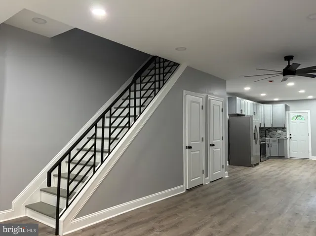 a view of entryway with wooden floor