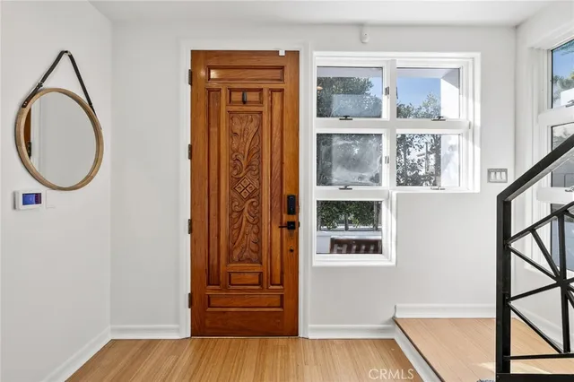 a front view of a house with parking