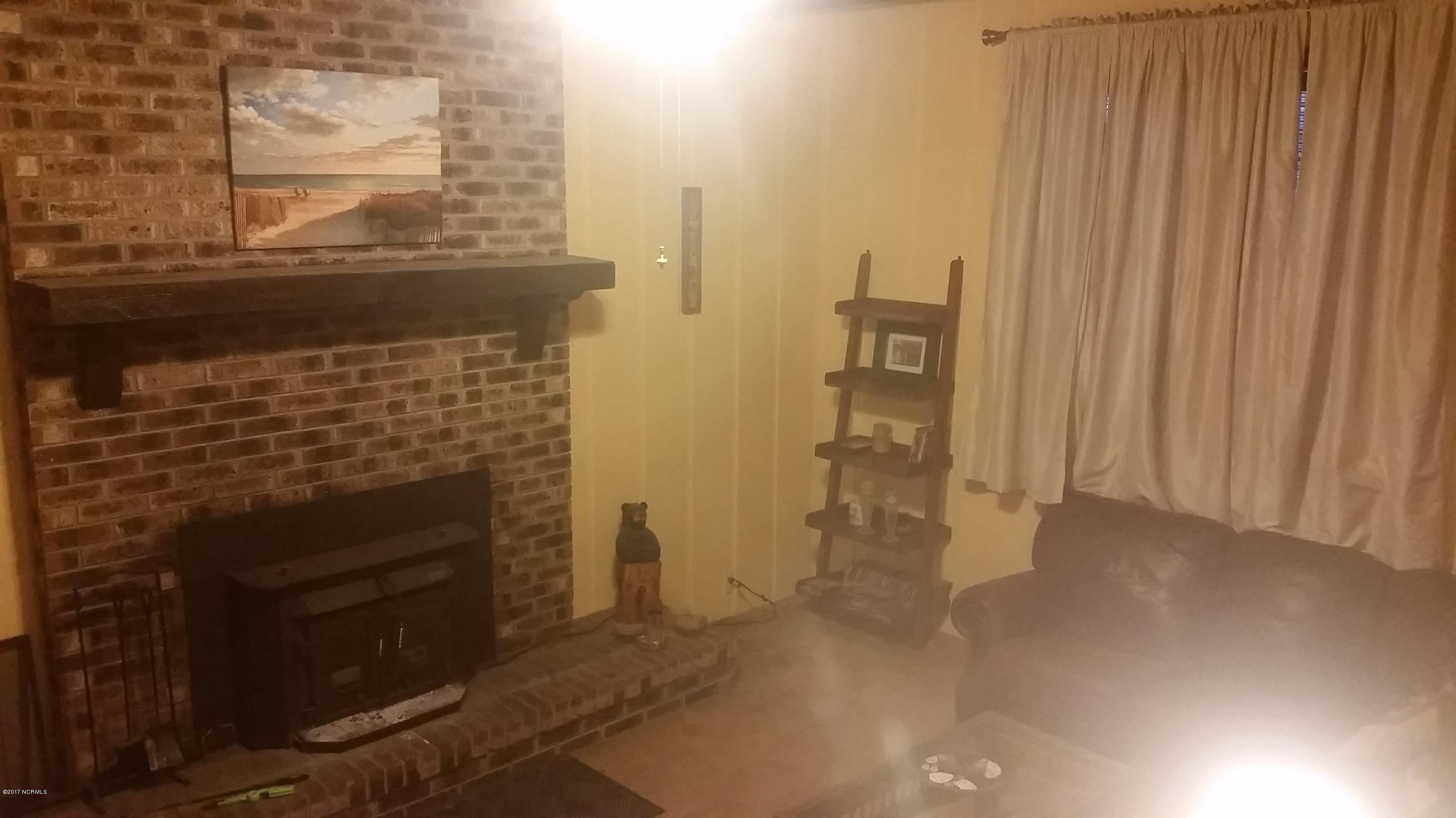 6443 Funston Road Southeast Winnabow, NC 28479 - Photo 14 of 25 Wood burning fireplace