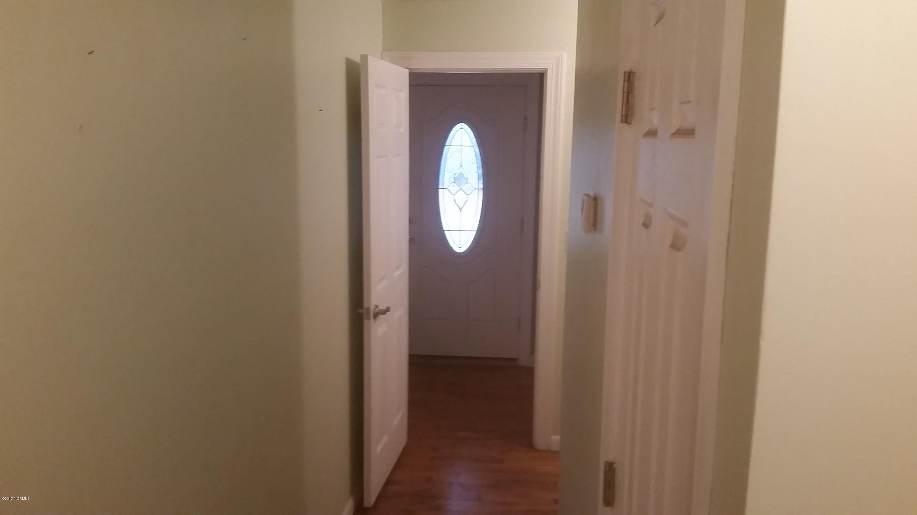 6443 Funston Road Southeast Winnabow, NC 28479 - Photo 6 of 25 Hallway to front door