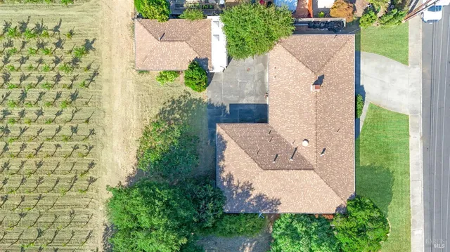 front view of a house with a garden