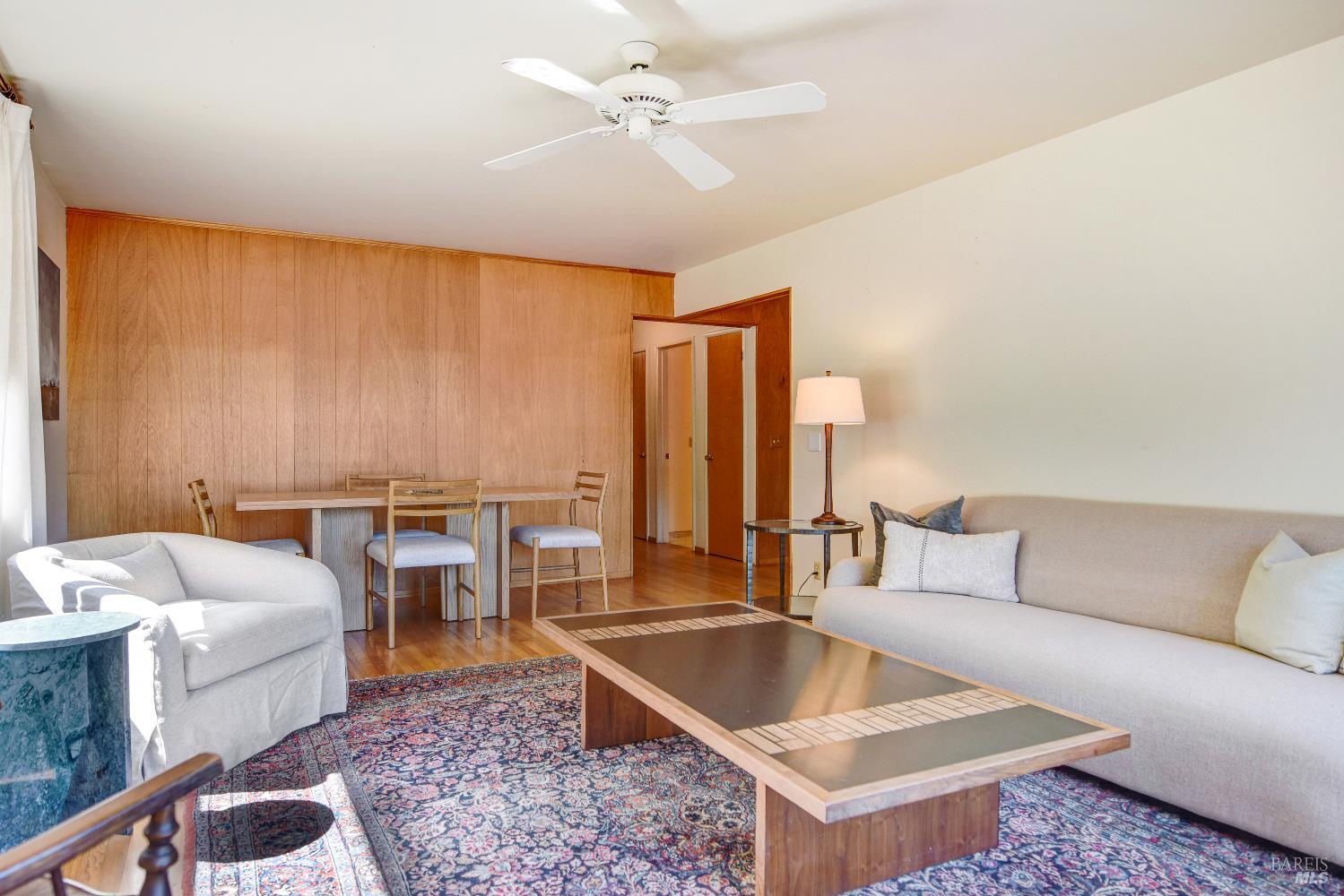 2040 Olive Avenue St. Helena, CA 94574 - Photo 6 of 25 a living room with furniture and a couch