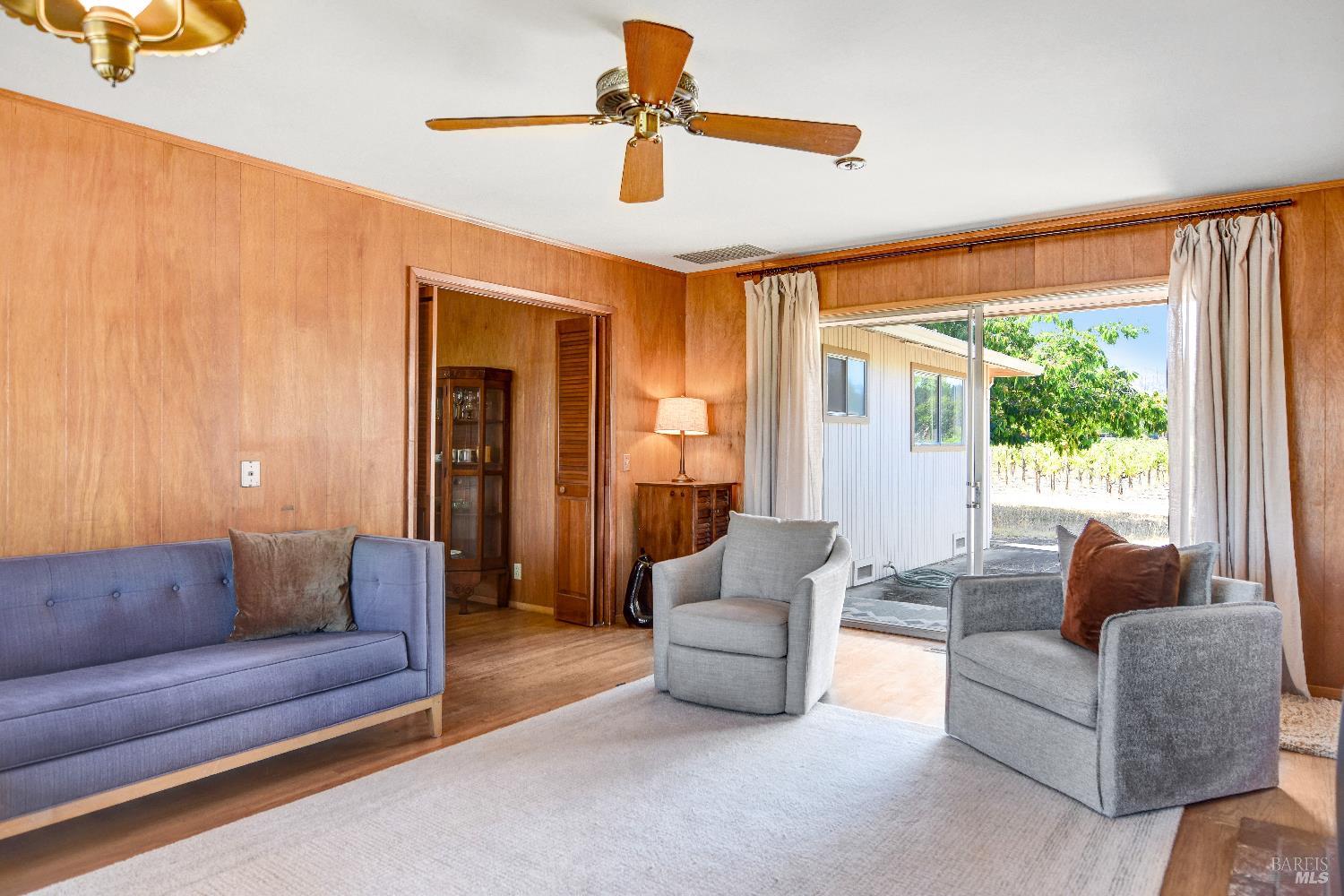 2040 Olive Avenue St. Helena, CA 94574 - Photo 10 of 25 a living room with furniture and a large window