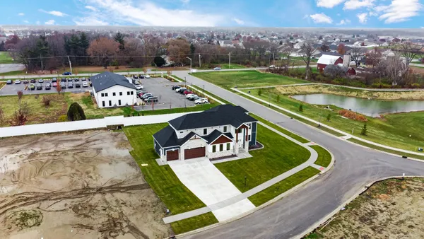 a front view of a house with yard