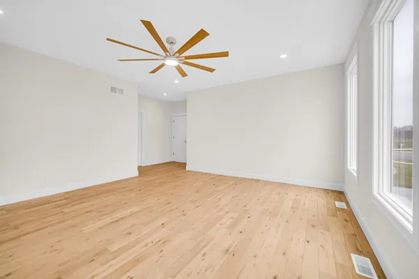 an empty room with windows