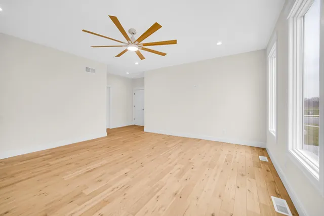 an empty room with windows