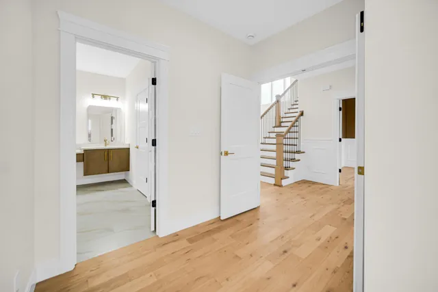 a kitchen with stainless steel appliances a sink and a large window