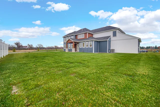 a house with yard in front of it