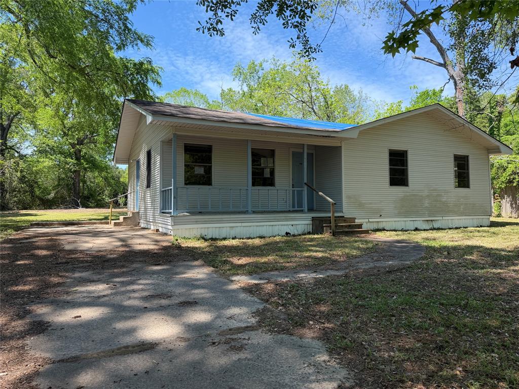 336 Butler Street Rusk, TX 75785 - Photo 2 of 27 a house with a yard