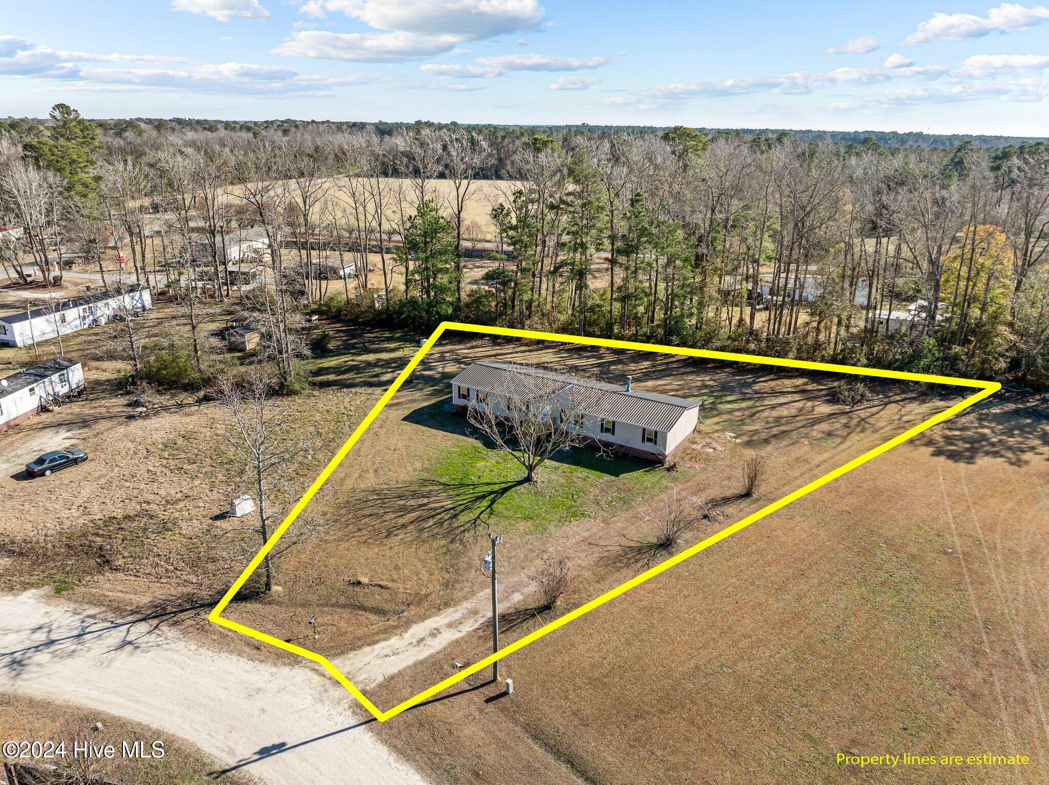 49 Stage Coach Road Ivanhoe, NC 28447 - Photo 1 of 46 6-web-or-mls-DJI_20241223123101_0897_D_1