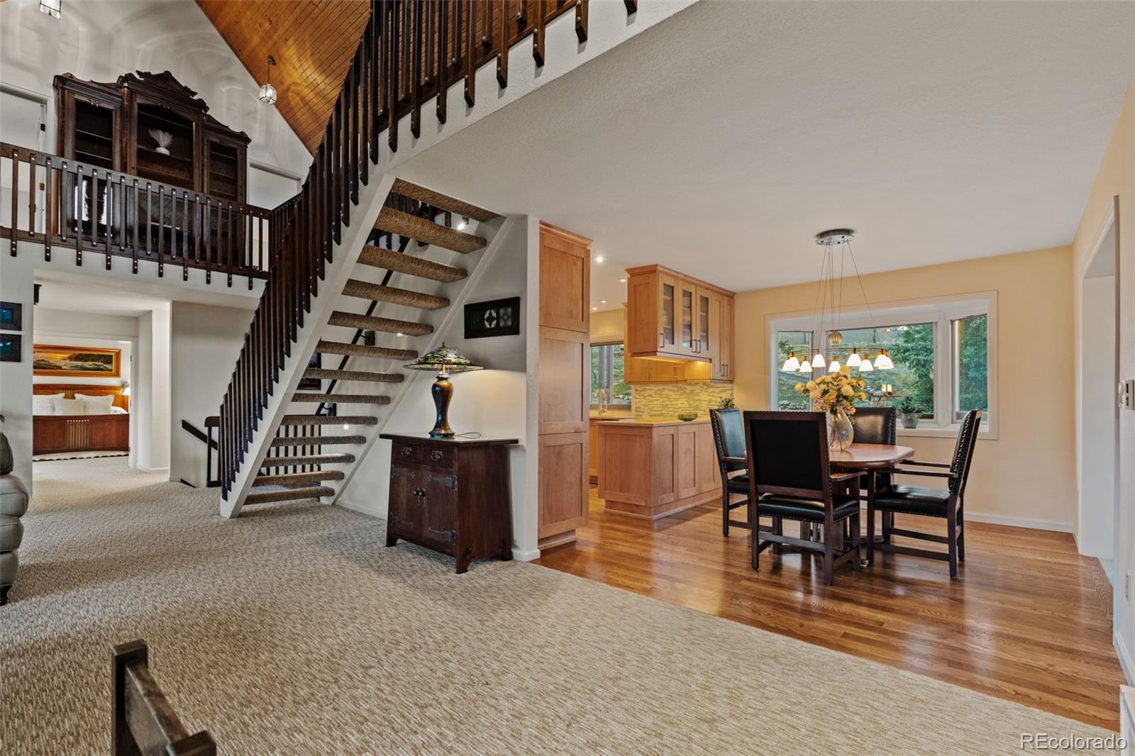 830 Jesse Lane Bailey, CO 80421 - Photo 11 of 45 a view of a livingroom with furniture and staircase