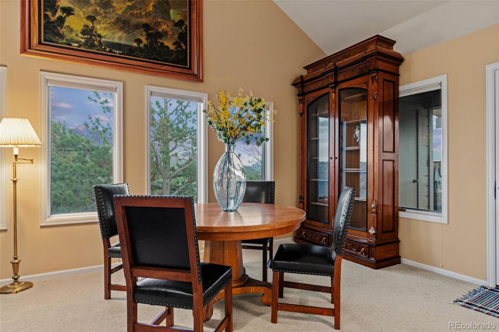 830 Jesse Lane Bailey, CO 80421 - Photo 16 of 45 a view of a dining room with furniture and a window