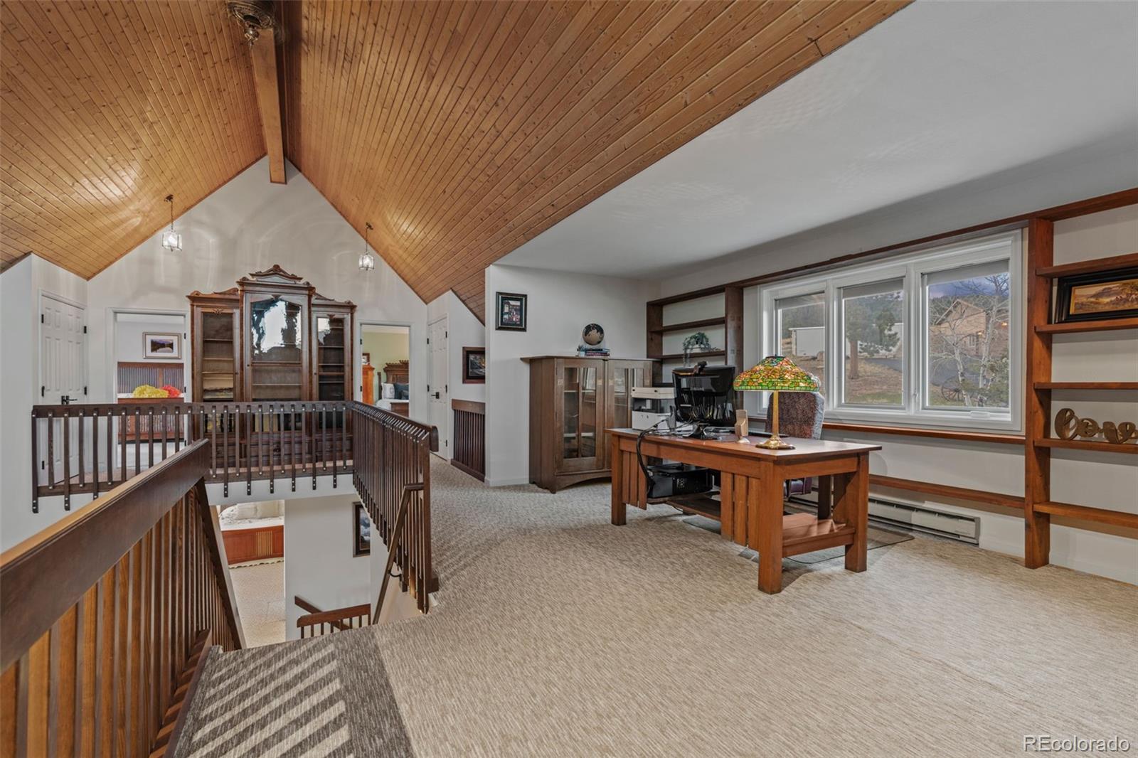 830 Jesse Lane Bailey, CO 80421 - Photo 25 of 45 a living room with furniture and a window