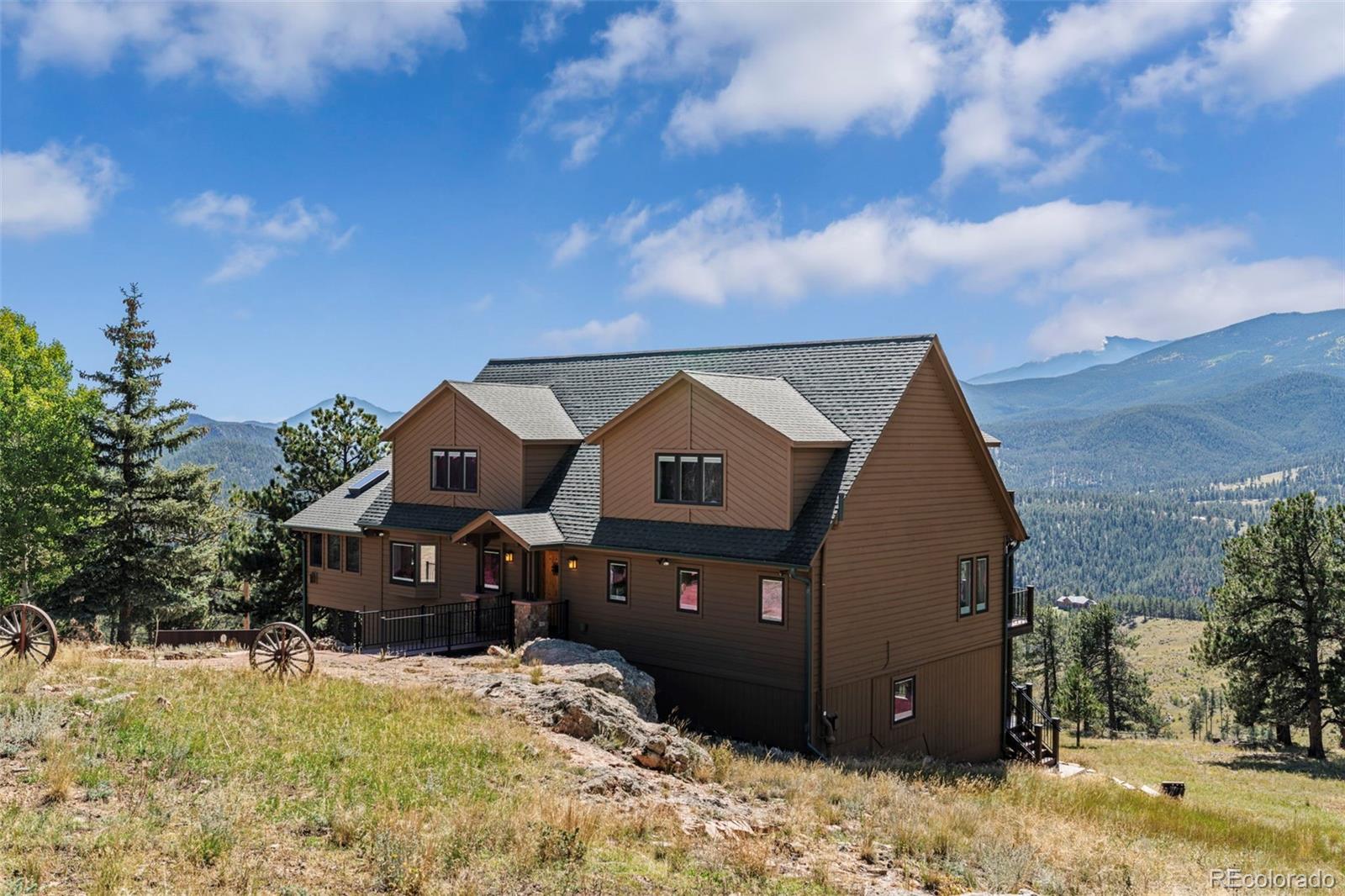 830 Jesse Lane Bailey, CO 80421 - Photo 37 of 45 a view of a house with a yard