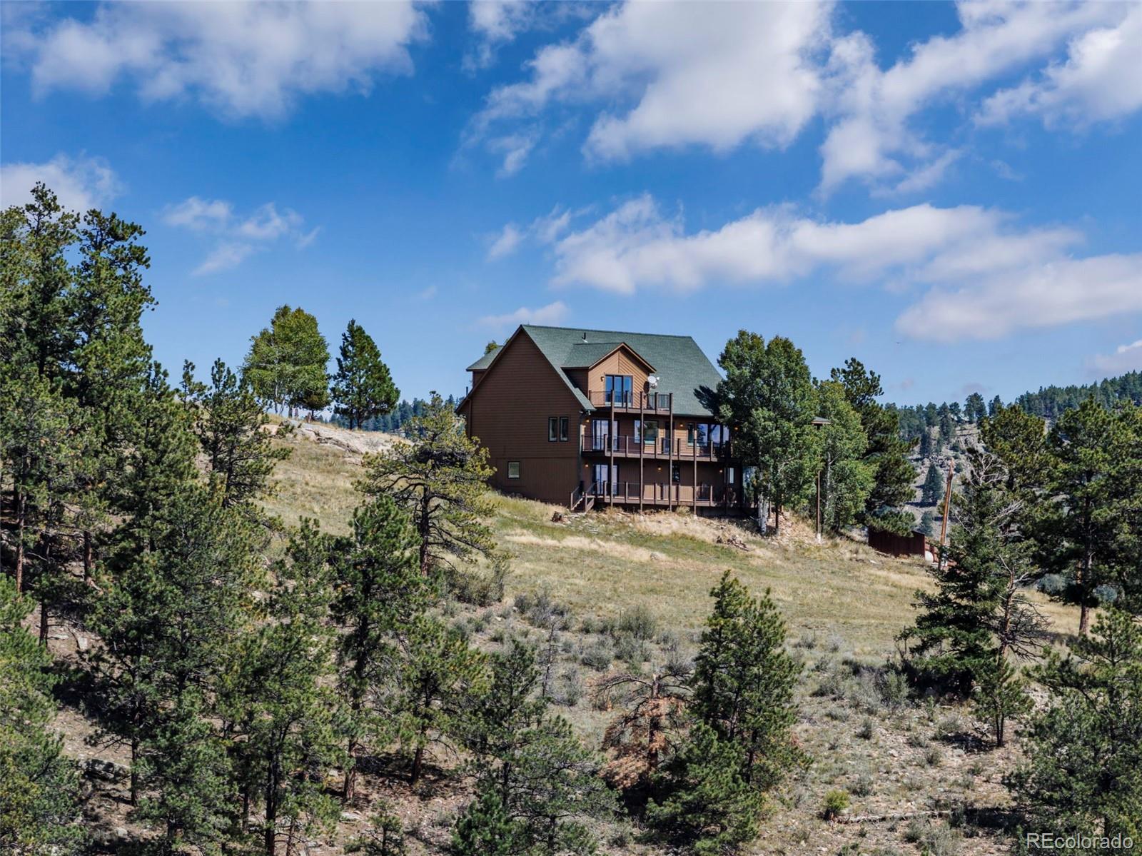 830 Jesse Lane Bailey, CO 80421 - Photo 44 of 45 a view of a houses with sky view