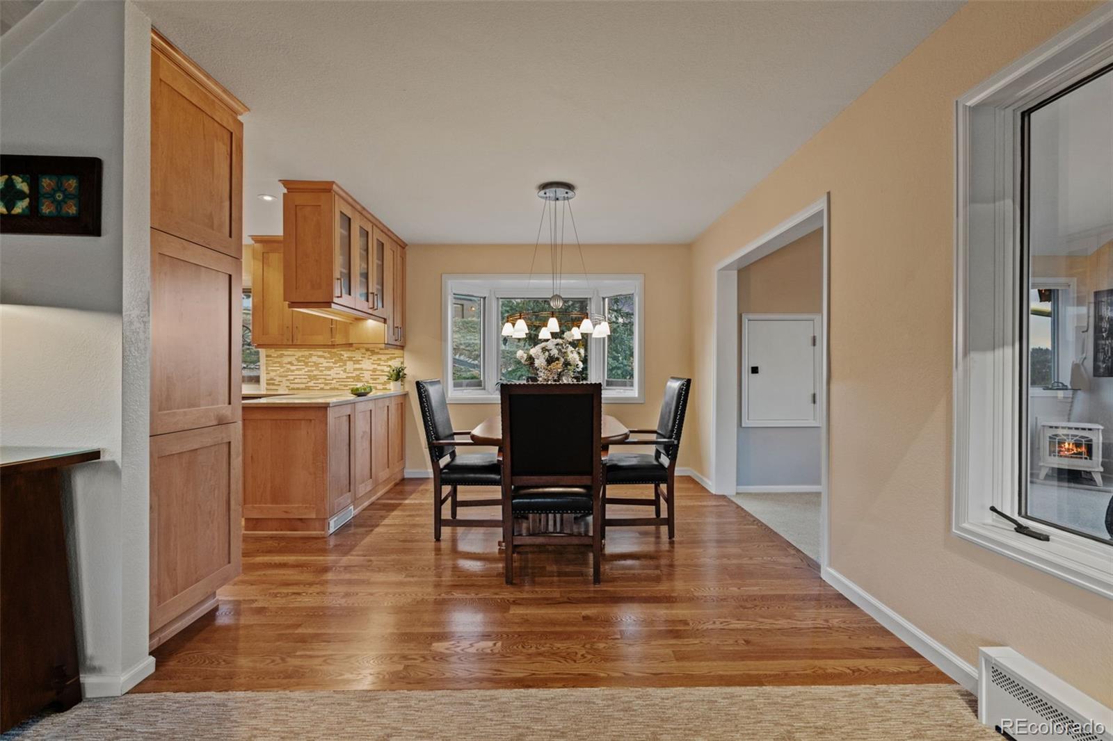 830 Jesse Lane Bailey, CO 80421 - Photo 10 of 45 a view of a dining room with furniture and window