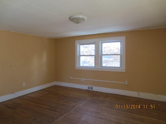 114 West Roosevelt Road Wheaton, IL 60187 - Photo 9 of 16 a view of a room with wooden floor and windows