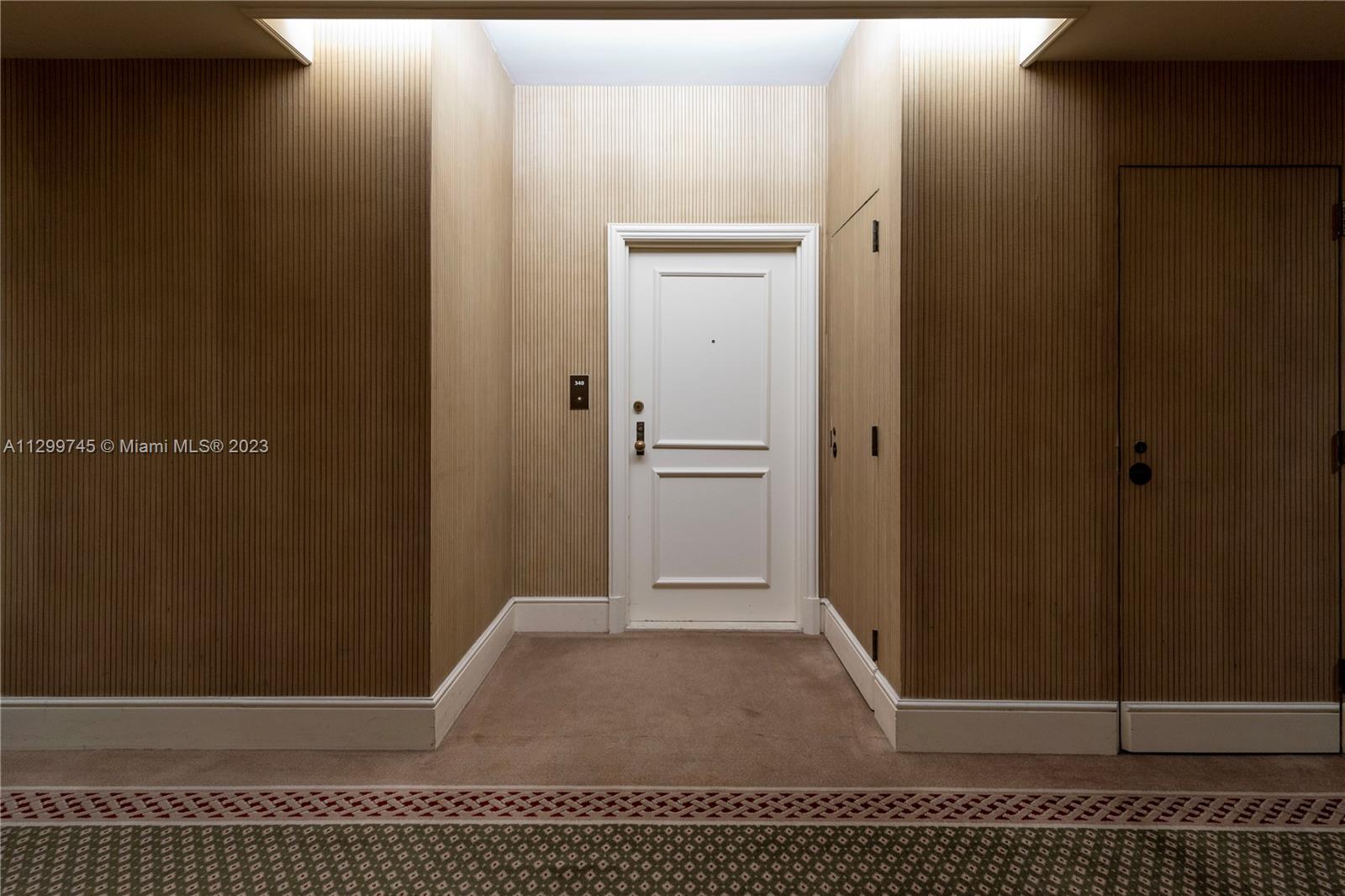 151 Crandon Boulevard, Unit 340 Key Biscayne, FL 33149 - Photo 20 of 26 a view of a hallway