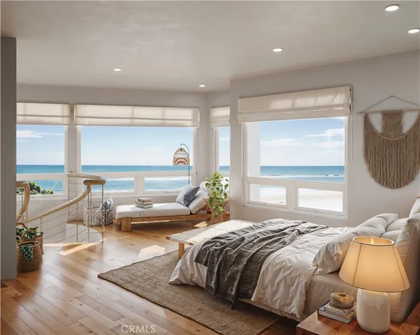 a bedroom with a bed and glass window