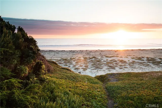 a view of beach and ocean