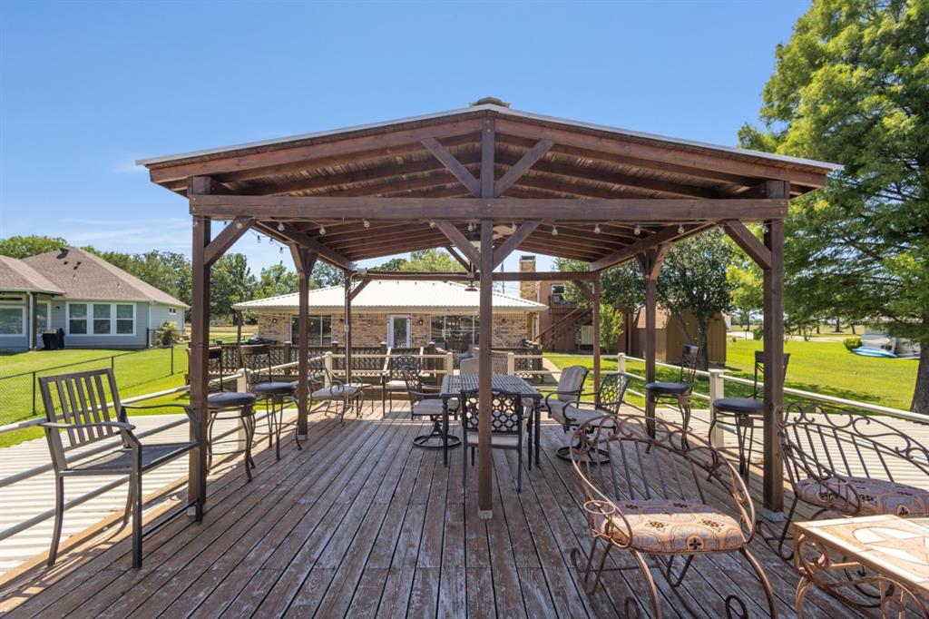 227 Scenic Road Trinidad, TX 75163 - Photo 30 of 40 a view of a swimming pool with a patio