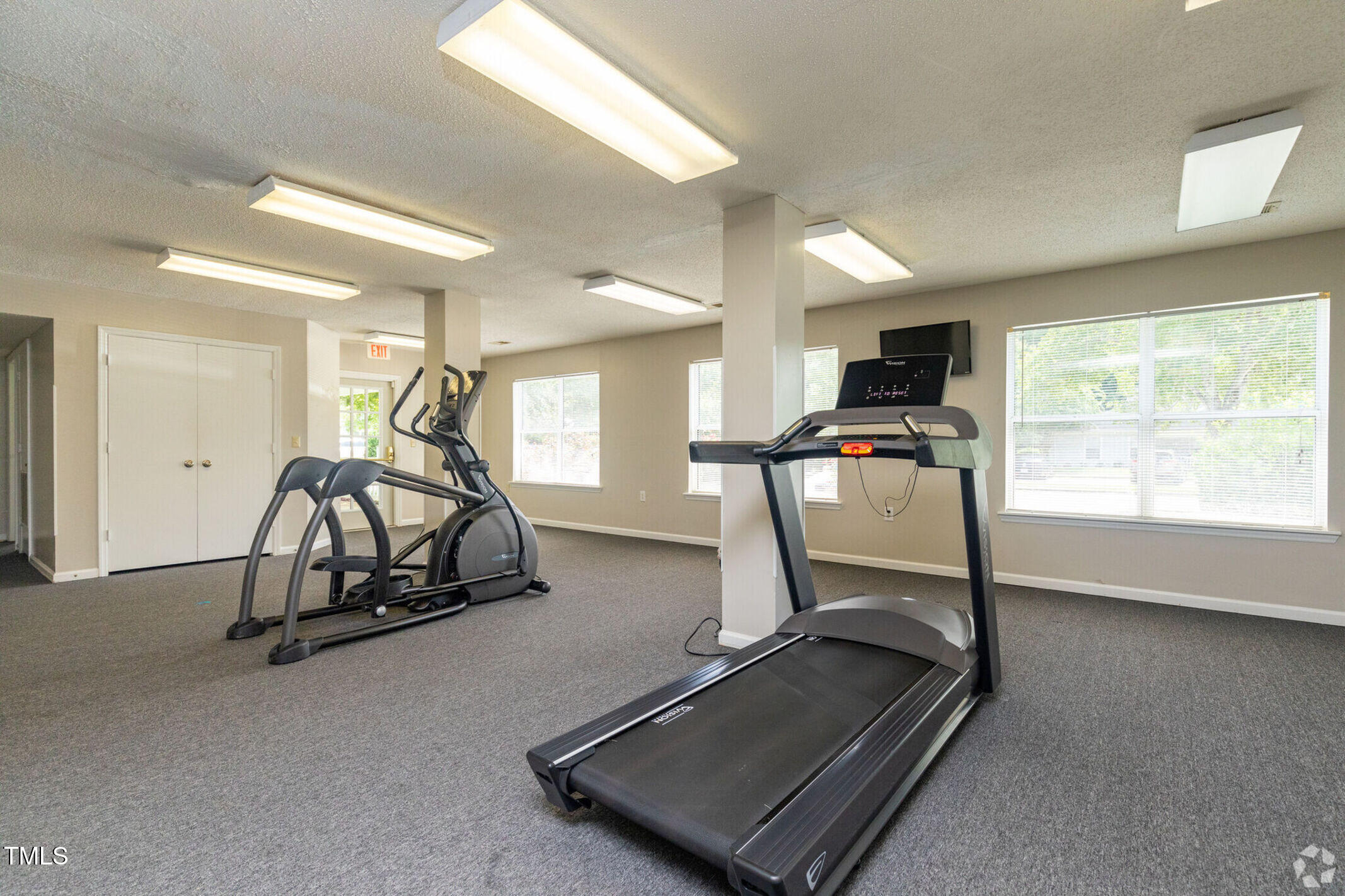 115 Holiday Park Road, Unit 3BED Hillsborough, NC 27278 - Photo 12 of 16 a view of a room with gym equipment