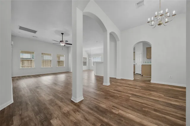 a view of a livingroom with wooden floor