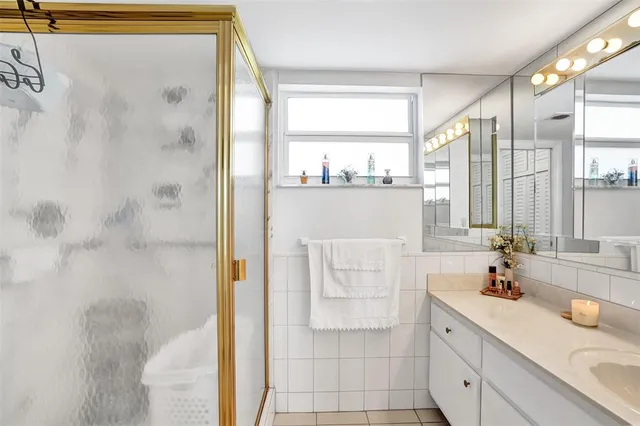 a view of a kitchen from a hallway