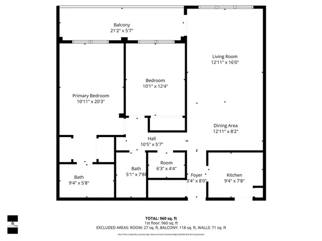 a view of washer and dryer with bathroom in the background
