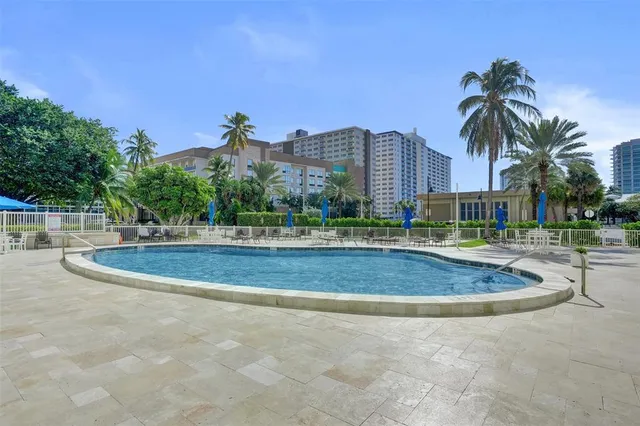 a view of a building with a swimming pool