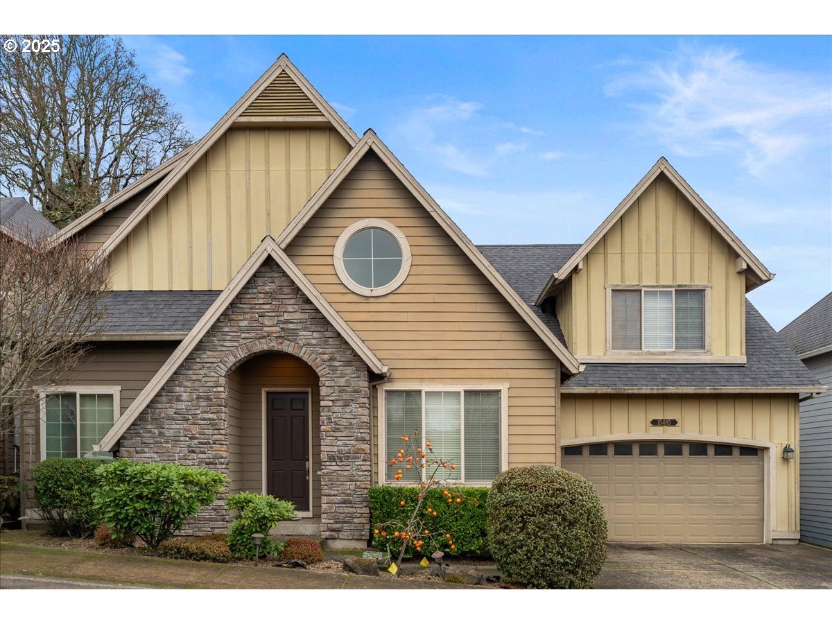 15485 Southwest Willamette Valley Court Beaverton, OR 97007 - Photo 1 of 48 a view of a house with yard and balcony