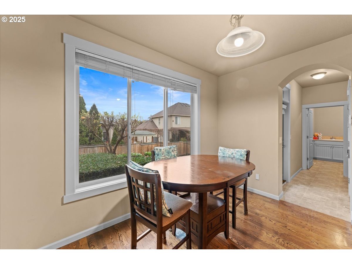 15485 Southwest Willamette Valley Court Beaverton, OR 97007 - Photo 12 of 48 a dining room with furniture and window