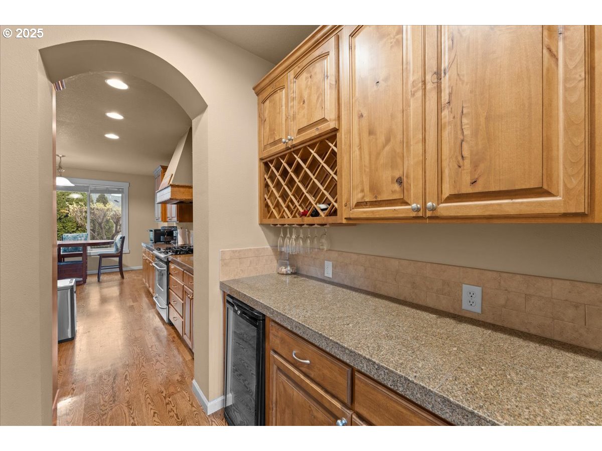15485 Southwest Willamette Valley Court Beaverton, OR 97007 - Photo 14 of 48 a kitchen with a sink and cabinets