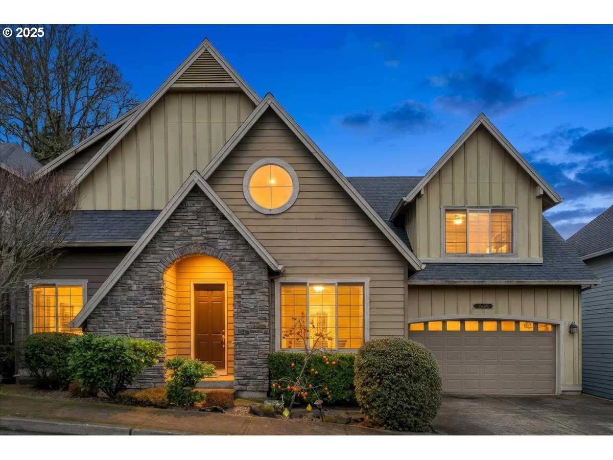 15485 Southwest Willamette Valley Court Beaverton, OR 97007 - Photo 2 of 48 a view of house with tub and trees in the background