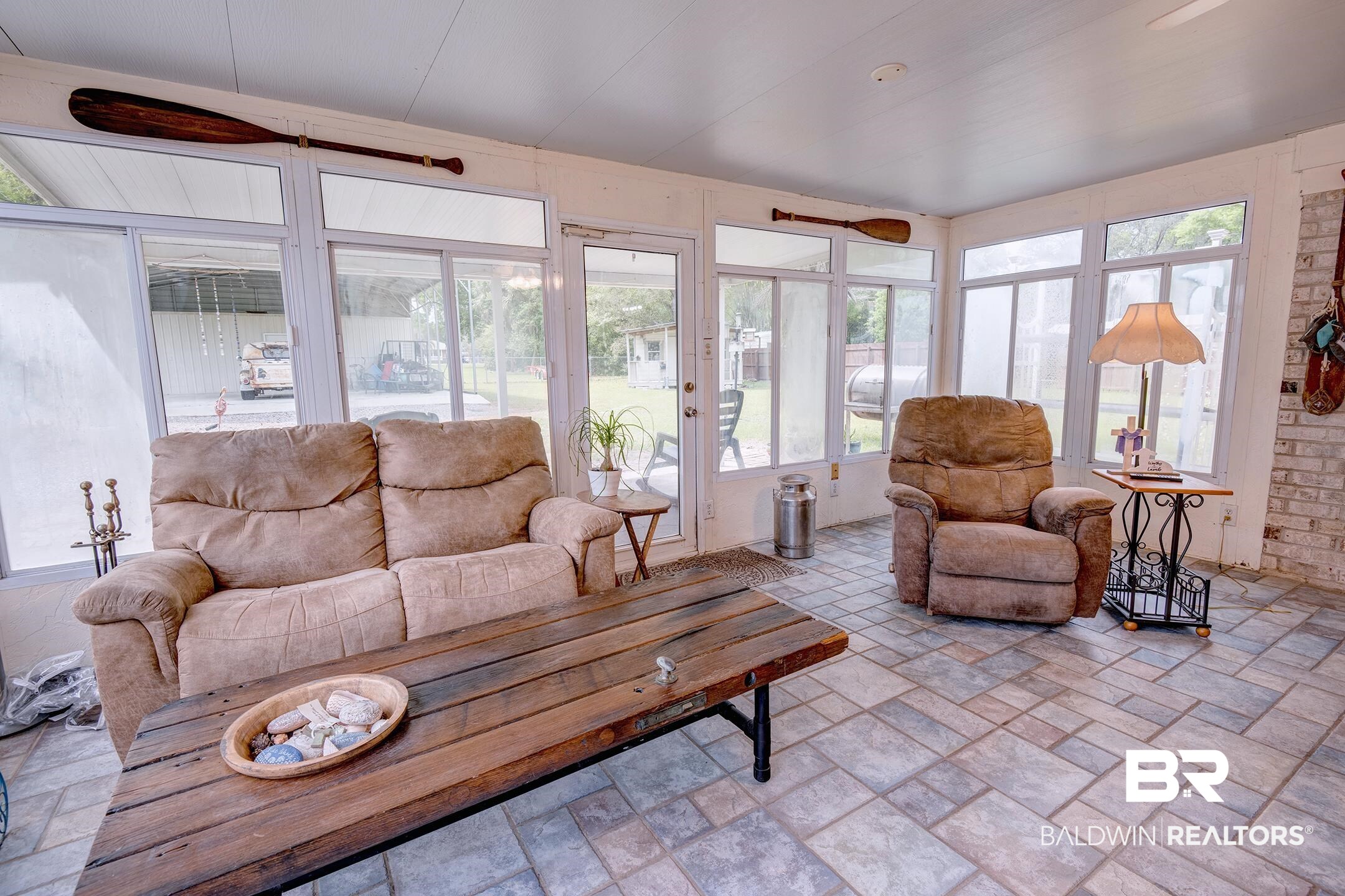 10093 Willis Road Foley, AL 36535 - Photo 25 of 33 Sunroom with stone tile flooring