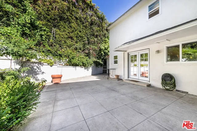 a view of a door and chair in the room