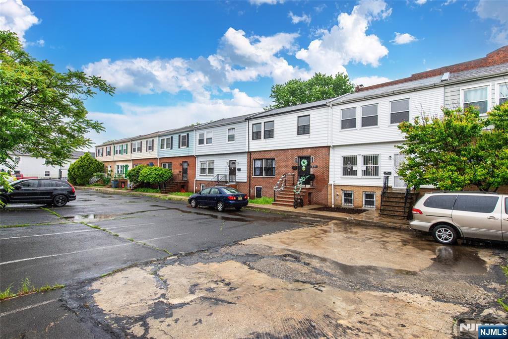 553 Ocean Avenue Jersey City, NJ 07305 - Photo 26 of 27 a view of a cars park in front of a building