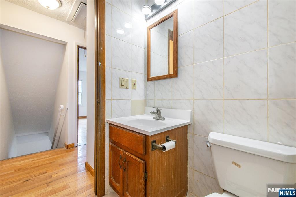 553 Ocean Avenue Jersey City, NJ 07305 - Photo 10 of 27 a bathroom with a sink toilet and shower