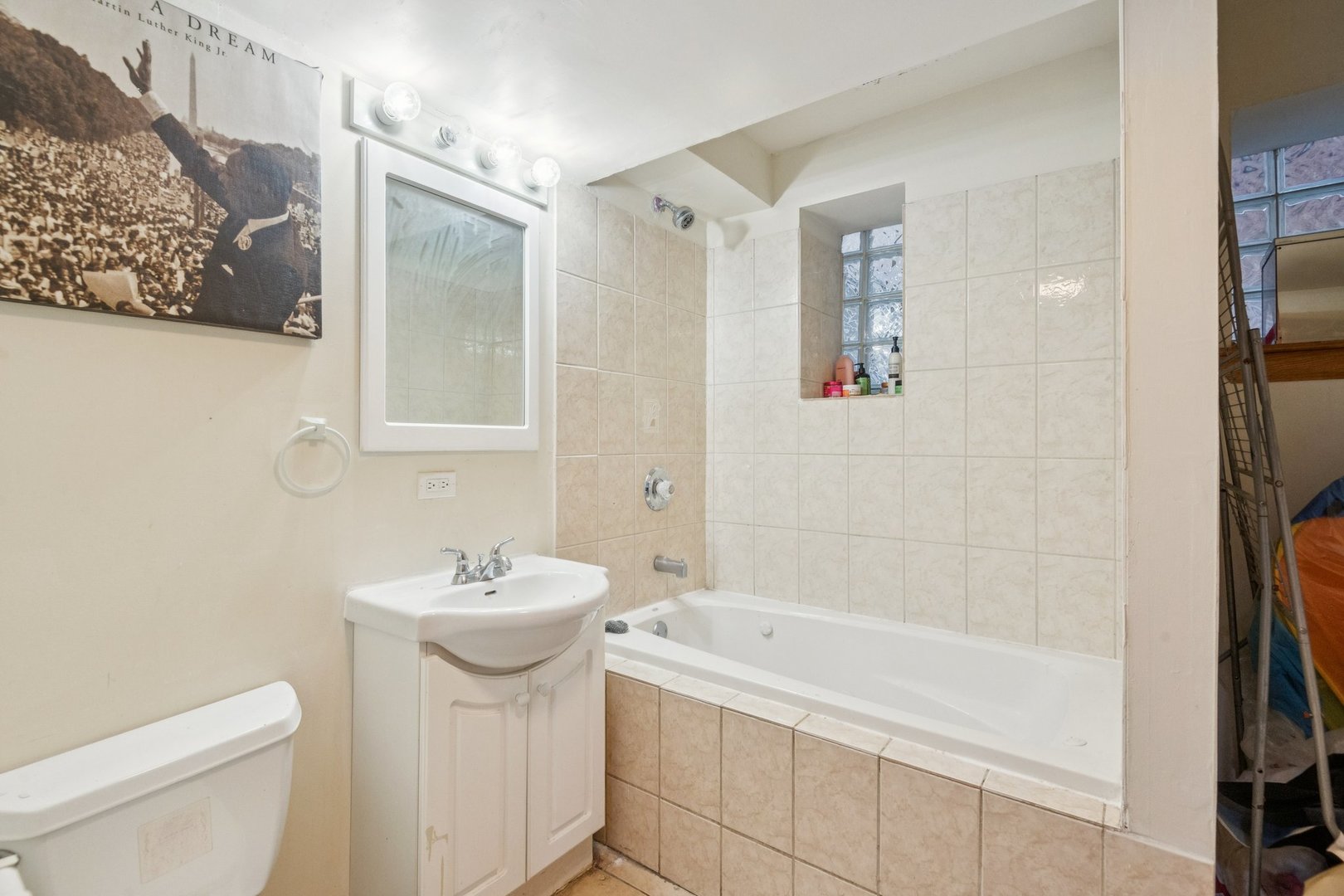 5016 South Prairie Avenue, Unit 1 Chicago, IL 60615 - Photo 10 of 10 a bathroom with a sink toilet and shower