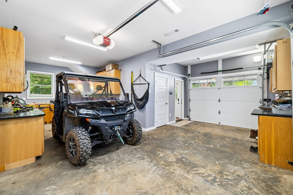 60 Buckeye Branch Road Morganton, GA 30560 - Photo 36 of 51 a room with lots of wooden furniture and a window