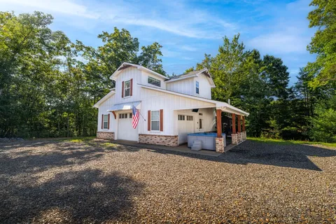 a house view with a outdoor space