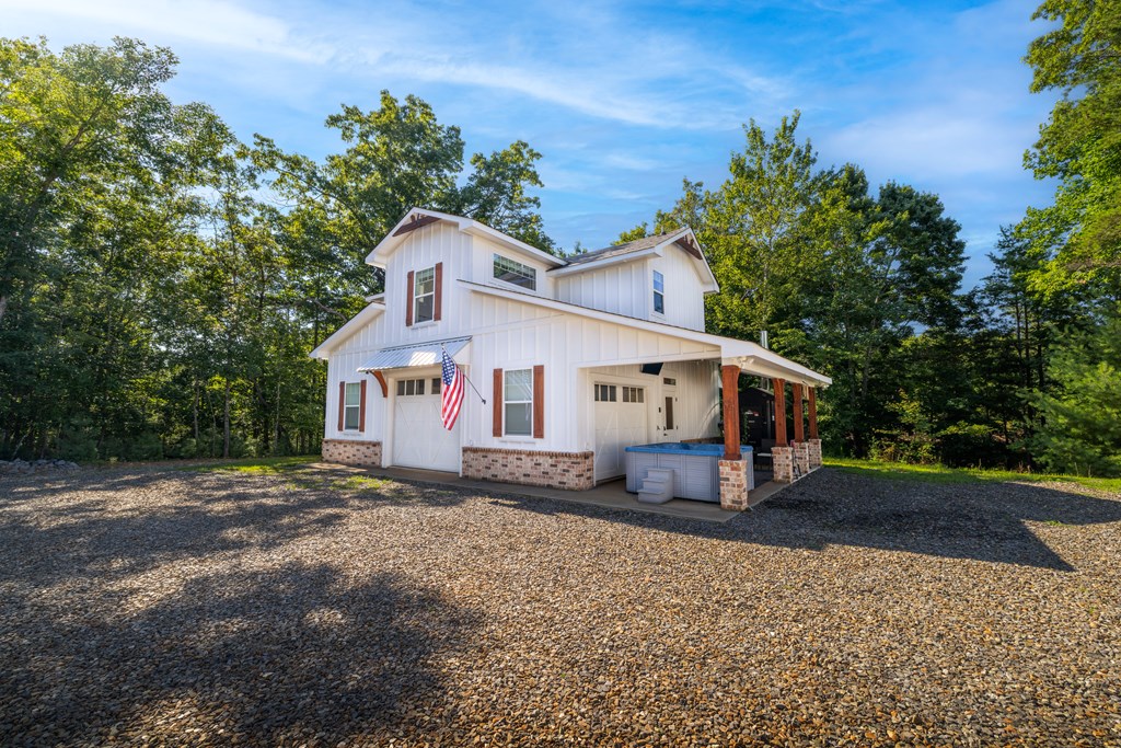 60 Buckeye Branch Road Morganton, GA 30560 - Photo 4 of 51 a house view with a outdoor space