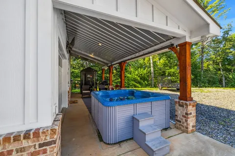 a view of a green field with lots of bushes