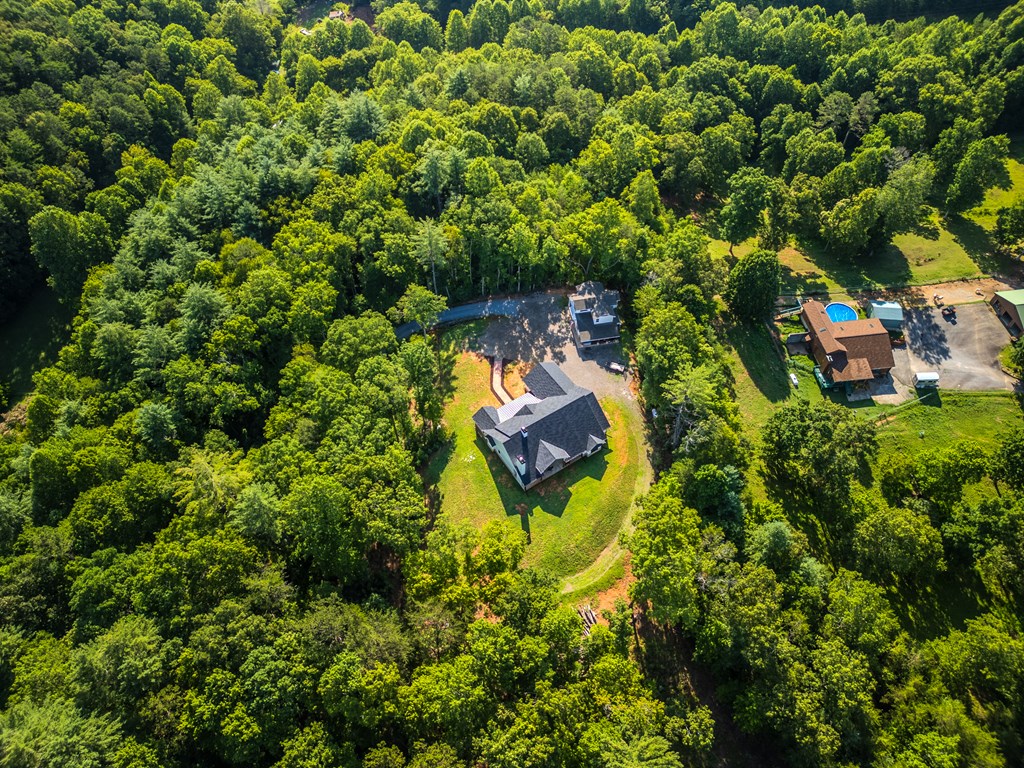 60 Buckeye Branch Road Morganton, GA 30560 - Photo 45 of 51 an aerial view of a house with a yard and swimming pool