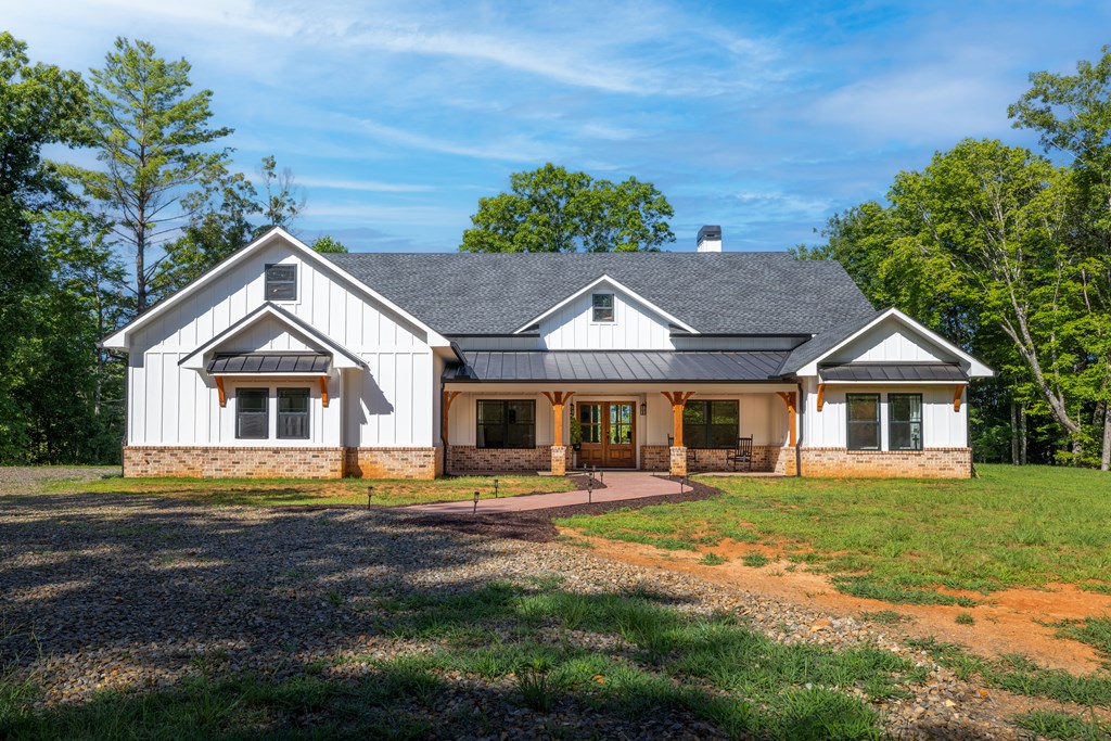 60 Buckeye Branch Road Morganton, GA 30560 - Photo 47 of 51 a front view of a house with a yard
