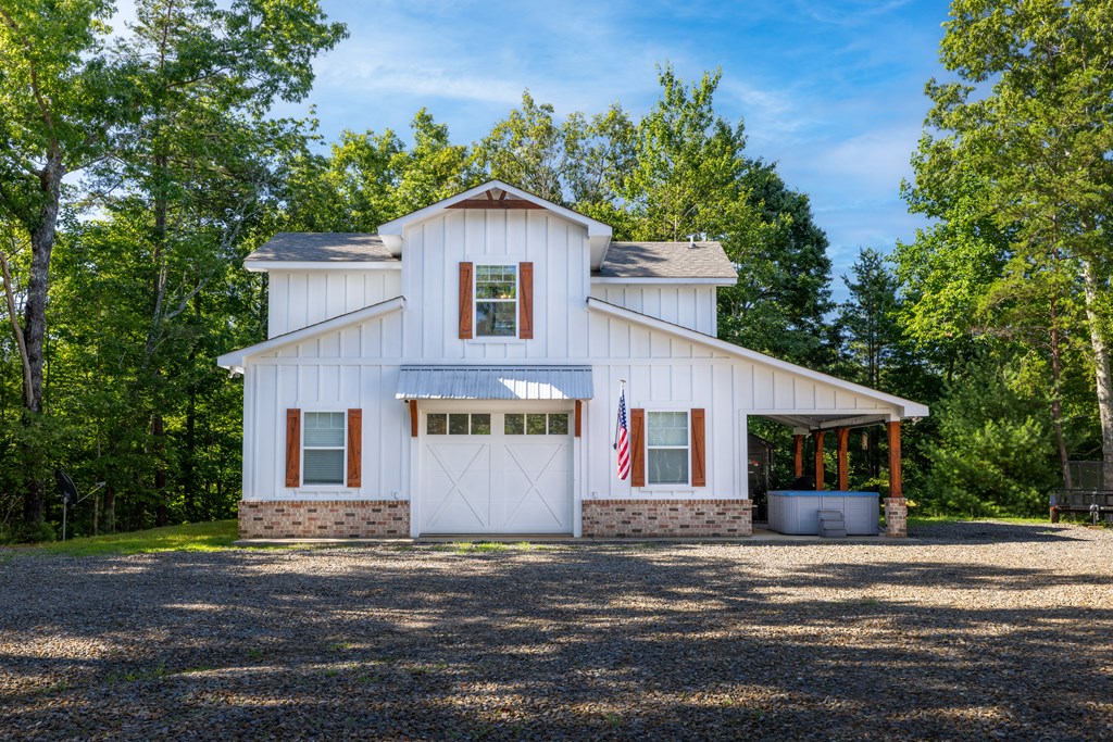 60 Buckeye Branch Road Morganton, GA 30560 - Photo 48 of 51 a front view of a house with a yard